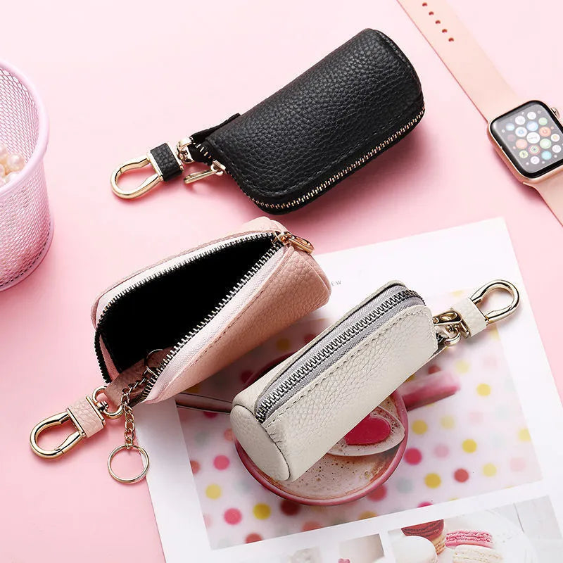 Waterproof PU key case with zipper closure in black, grey, or pink colours