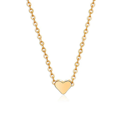 Elegant gold-tone double-sided love pendant necklace with clavicle chain, a versatile accessory for any outfit