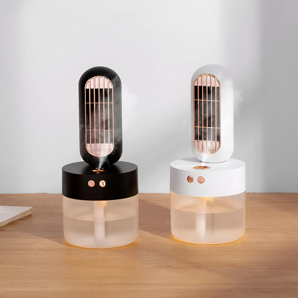 Small black and white humidifier fan with an oscillating head on a desk.