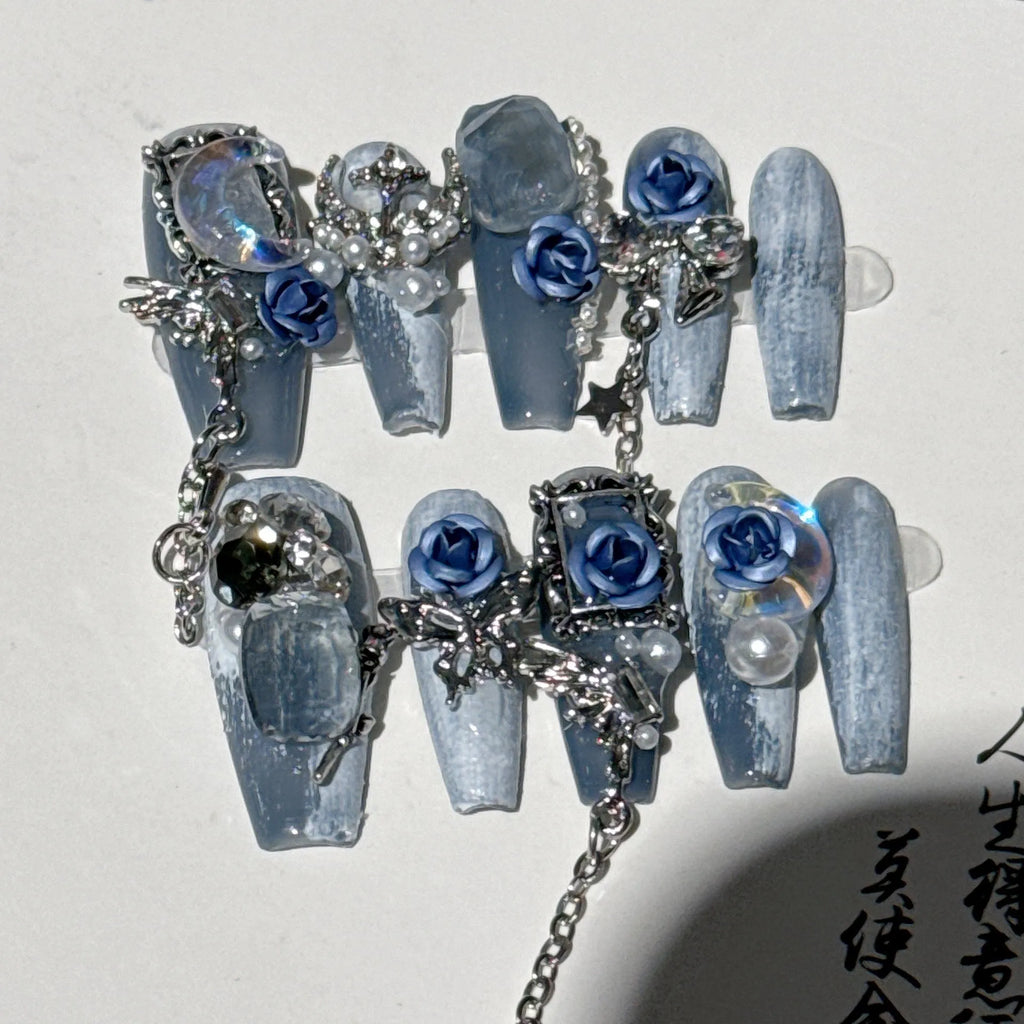 Evening manicure set with rose and tulip patterns in night blue colour featuring plastic armour suit