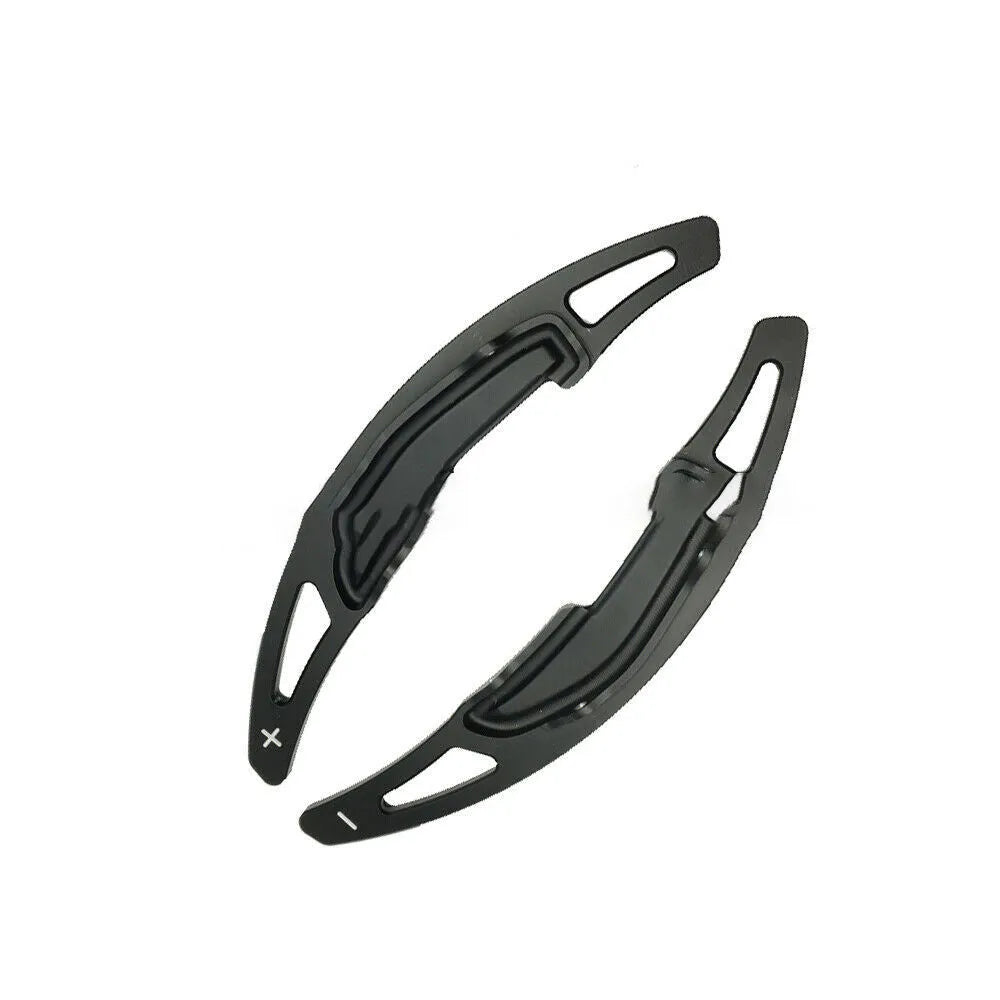Pair of BMW M paddle shift extenders in black with 3M adhesive and screws