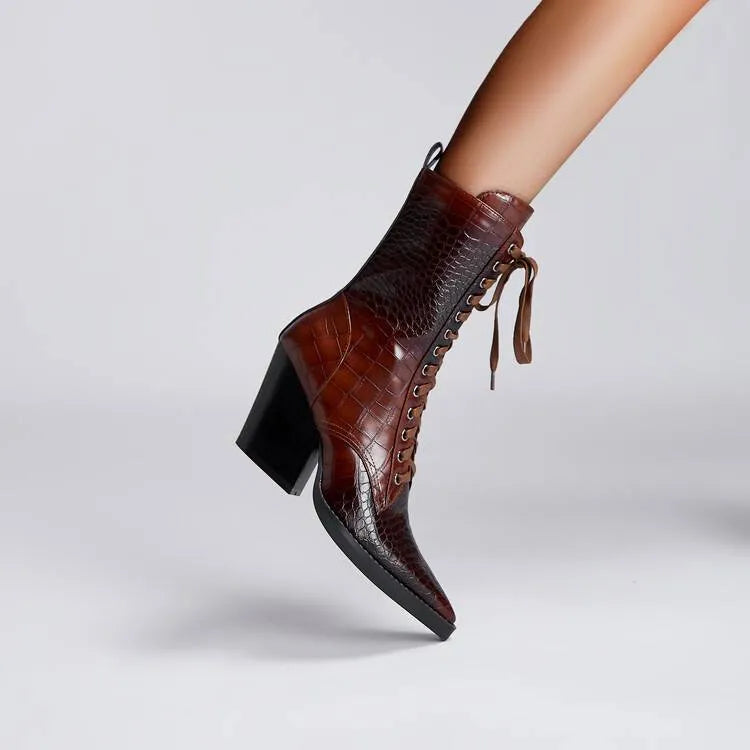 Dark brown retro pointed toe boots with a chunky heel and lace detail, side zipper visible.