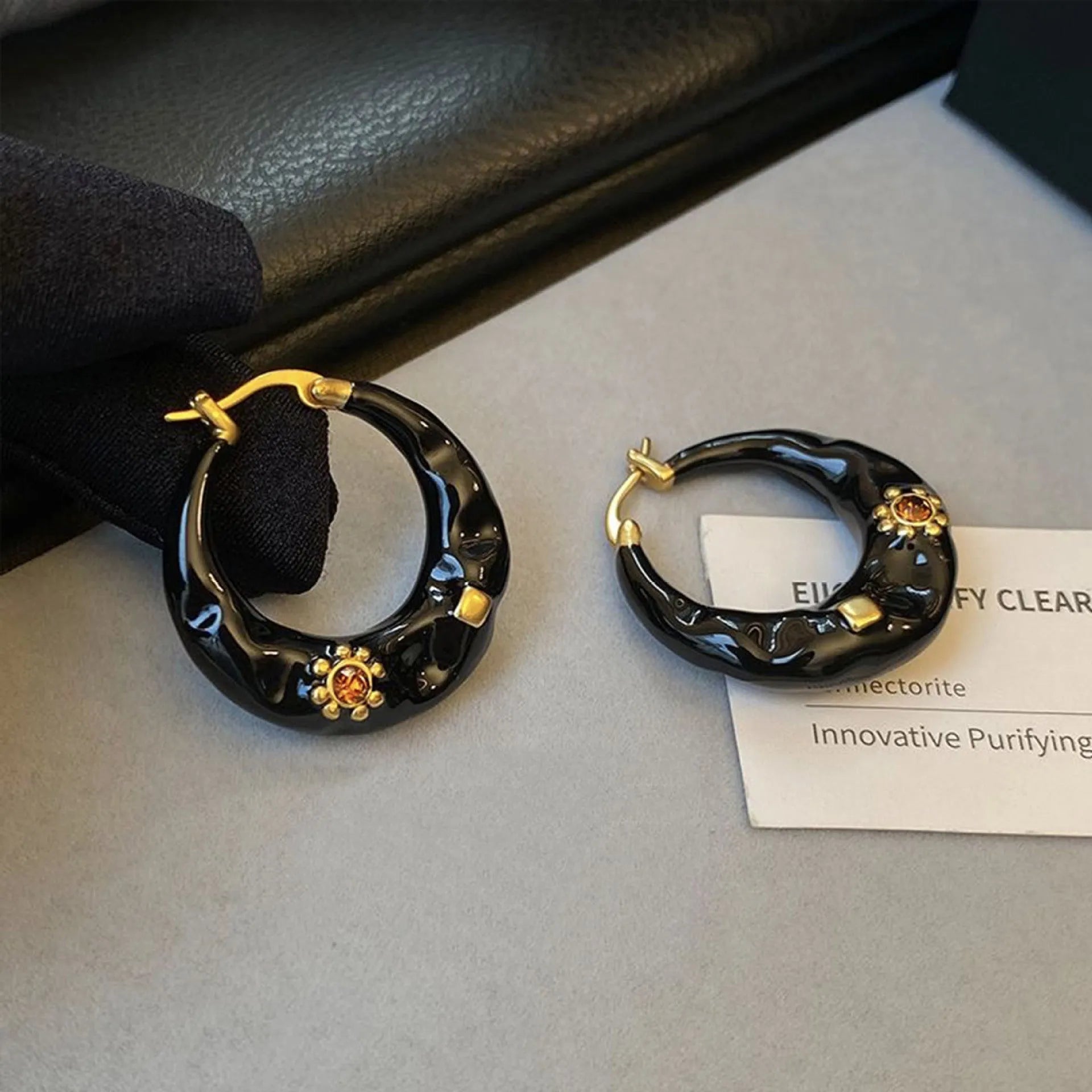 Hong Kong style retro ear studs with rhinestone inlay in black and red colour options
