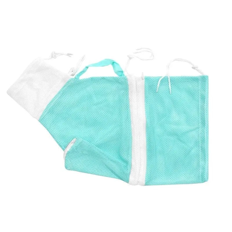 Pink and white detachable cat grooming bag with scratch-resistant fabric next to a miracle baby sponge.