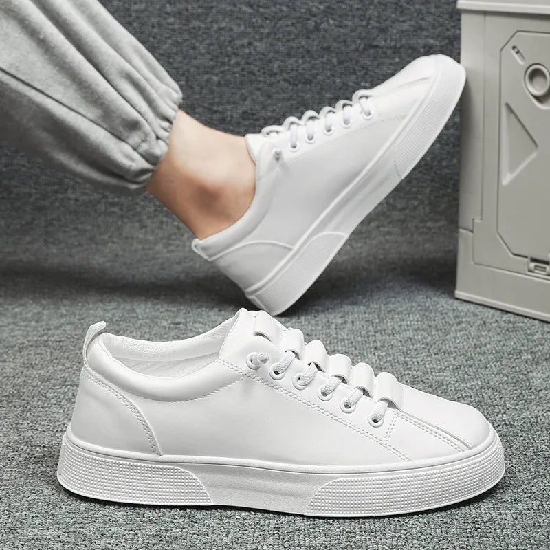 Men's black and white low top mesh sports shoes with synthetic leather upper and round toe design