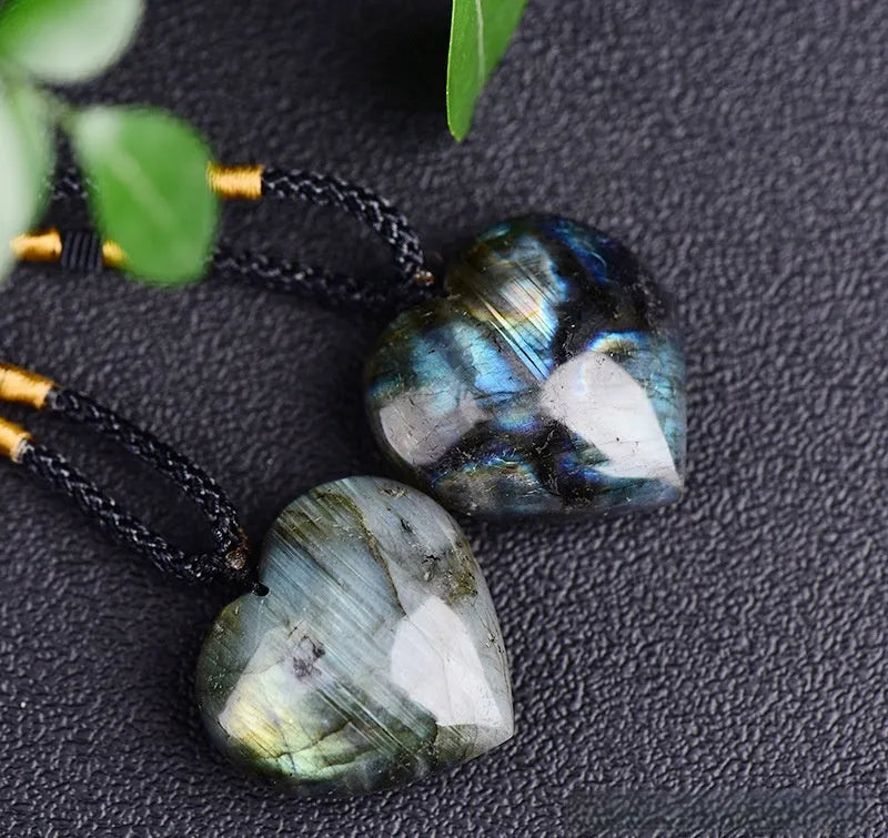 Blue labradorite moonstone heart of the ocean geometric pendant necklace on a chain.