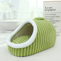 Striped thickened 3D dog bed with removable sponge mattress in blue, shown in a home setting