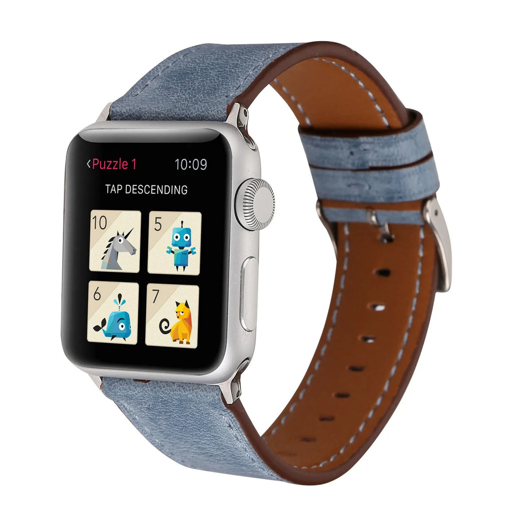 Coloured leather watch strap with a folding buckle on a watch case.