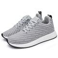 Men Malcolm Sneaker in black from side view showing mesh fabric upper and low-top design