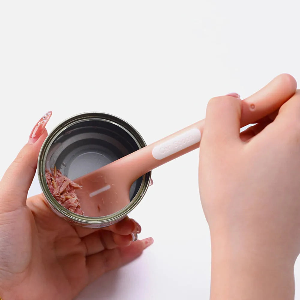 Green TPR pet feeding spoon with long handle and angled scoop for canned food