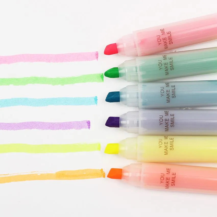 Six plastic highlighter pens with oblique shape and chisel tips in multiple colours for text marking