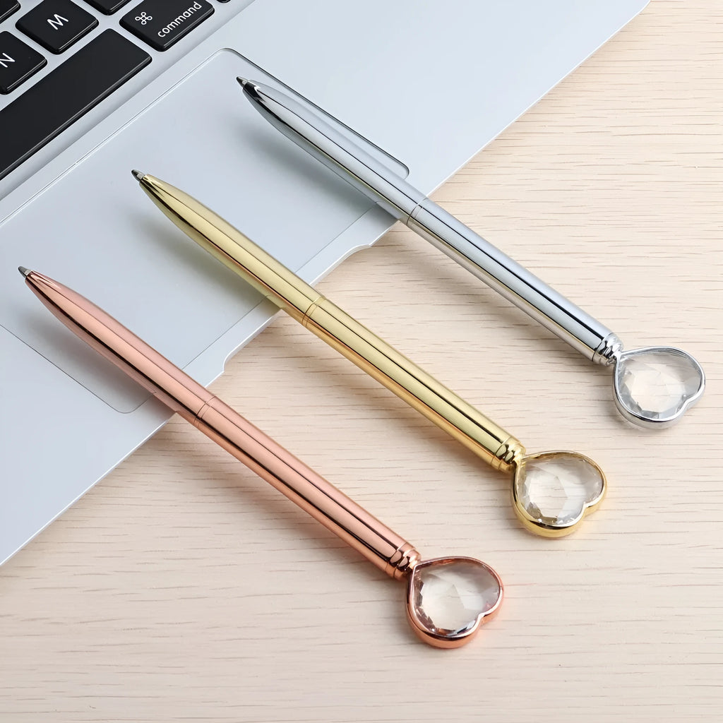 Creative Crystal Love Ball Diamond Metal Pen in gold, rose gold, and silver colours.