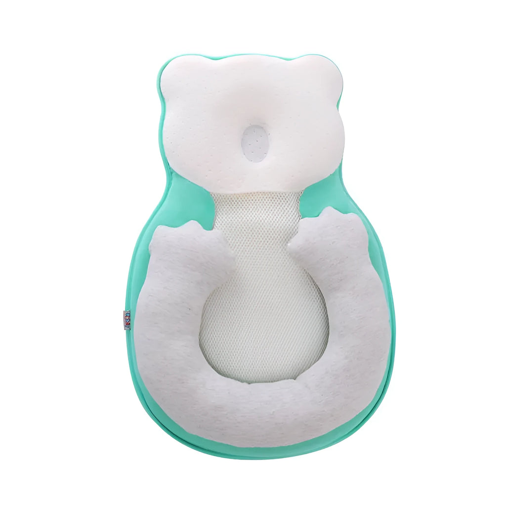Folded portable baby travel bed with a soft beige cotton sleep cushion for newborns
