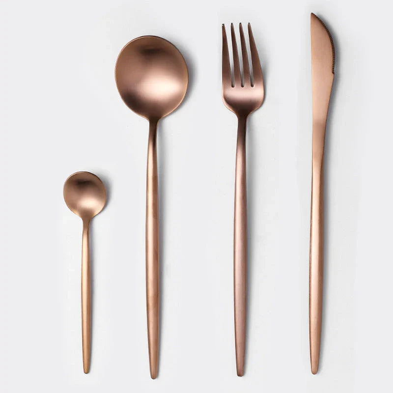 Premium stainless steel cutlery set with a mirror-polished finish, including coffee spoons, dessert spoons, main meal spoons, dessert forks, main forks, and chopsticks, presented in a stylish gift box.