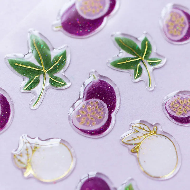 DIY fruit bronzing sticker set showing grape, orange, passion fruit, peach, pineapple and strawberry designs