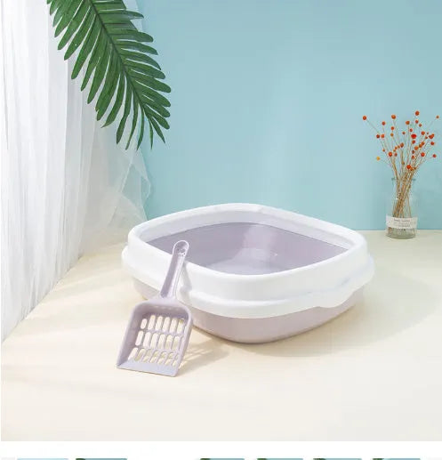 Large detachable anti-splashing plastic cat litter box in blue, suitable for indoor cats, with high sides and separate tray sections