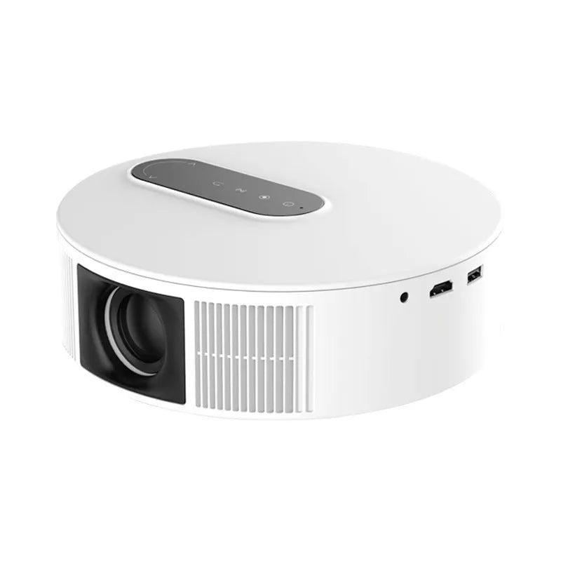 White HD home projector with remote control on table for bedroom cinema setup