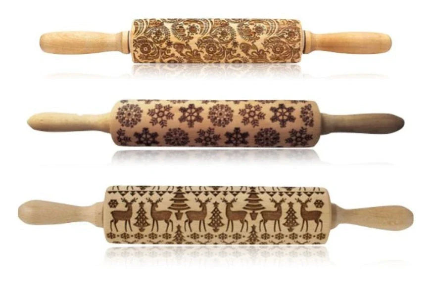 Personalized Christmas rolling pin with a variety of embossed holiday designs, including snowflakes, reindeer, and Merry Christmas patterns