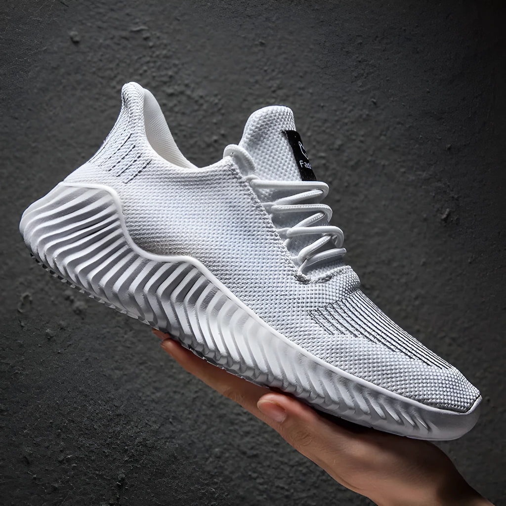 Men's breathable ultra-light running shoes with white upper and grey sole, side view