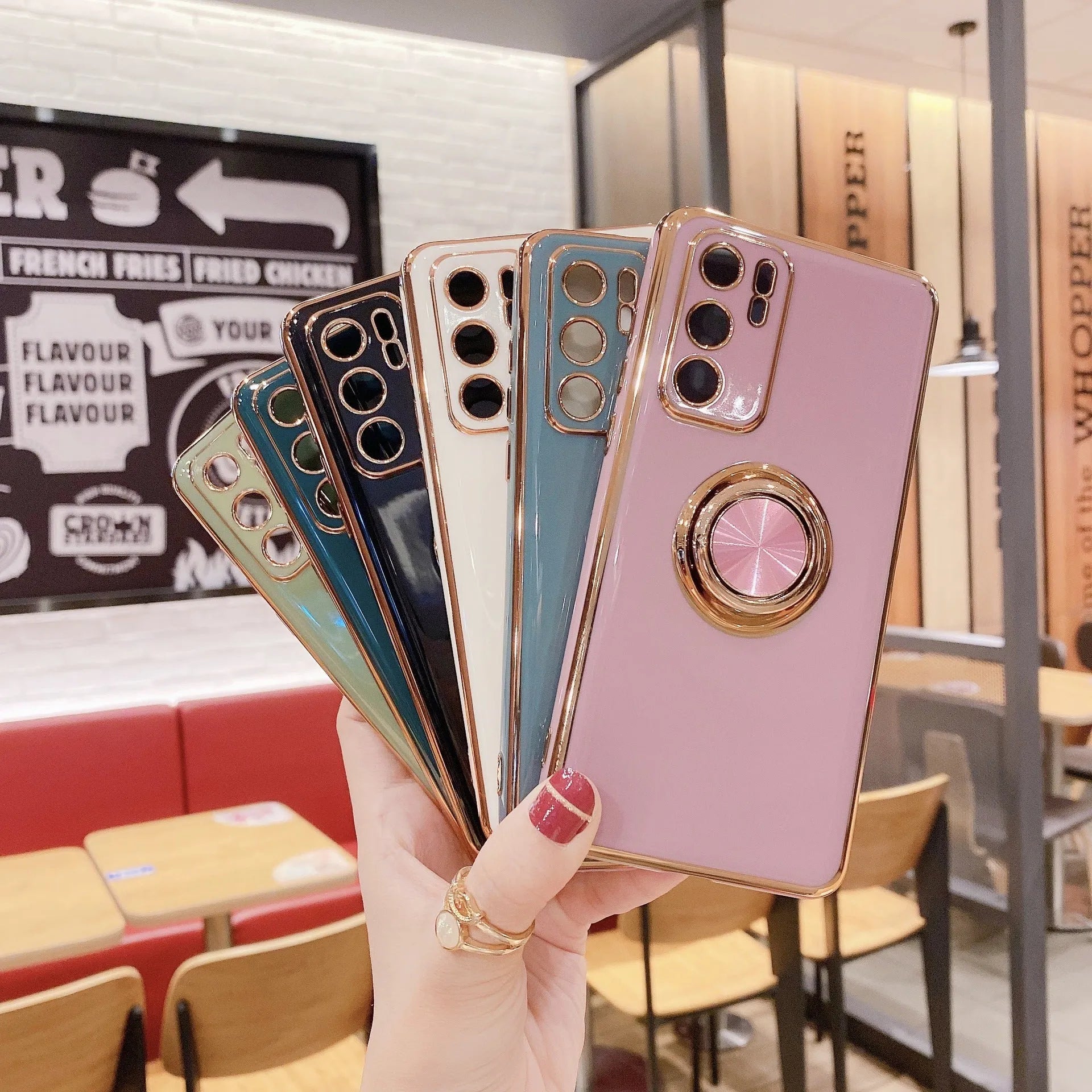 Huawei mobile phone case with a ring bracket and magnetic mount compatibility in assorted colours.