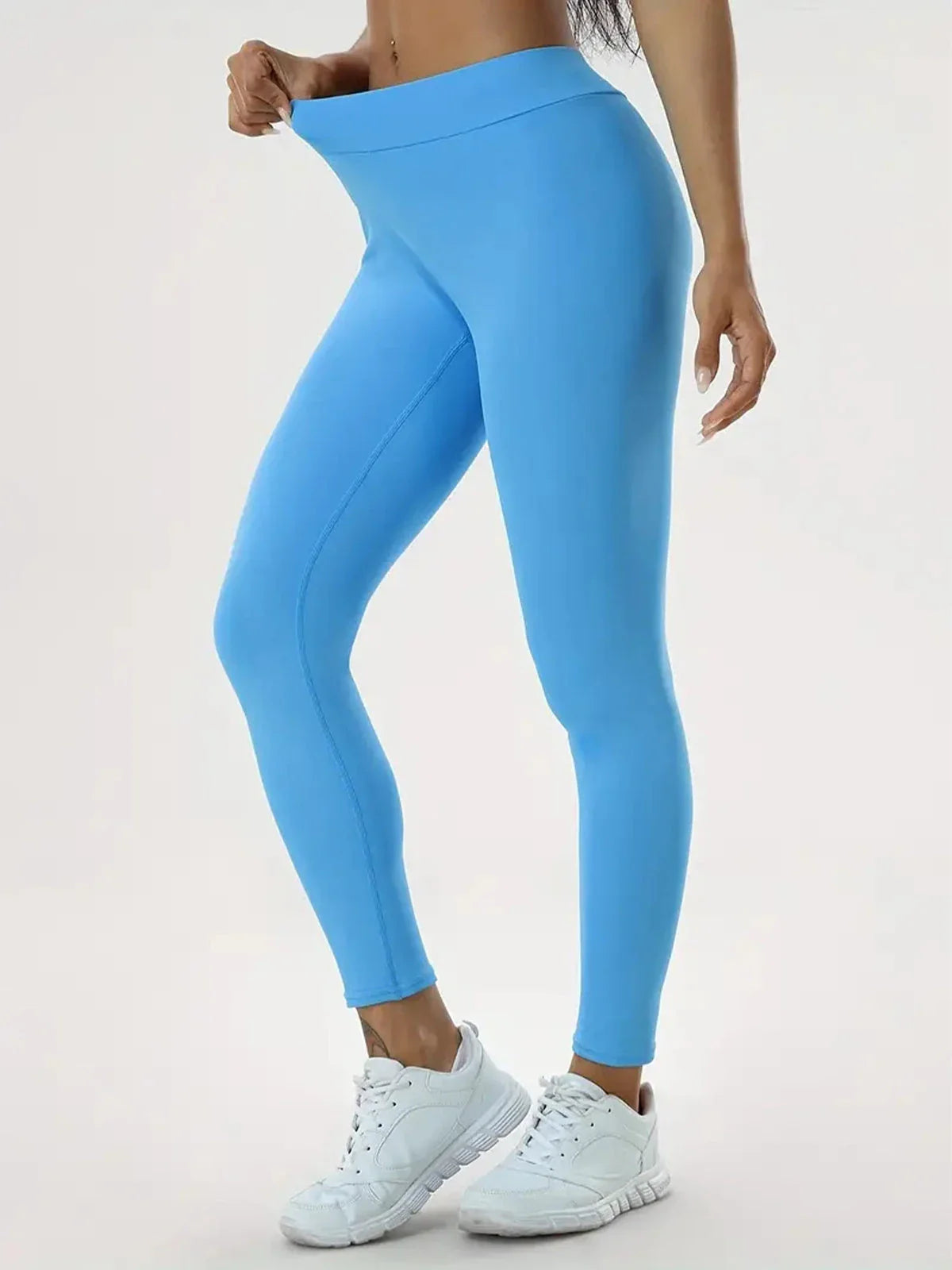 Women's high-waist yoga pants made of premium polyester fabric with a slimming, flattering design