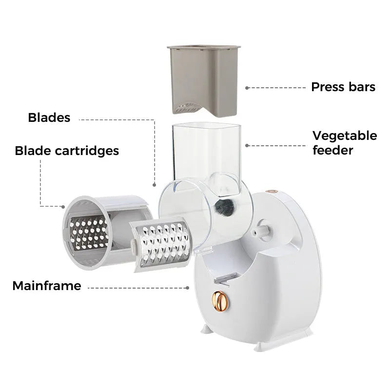 White electric vegetable slicer with rotary grater, feeding port, and multiple blade options on kitchen counter