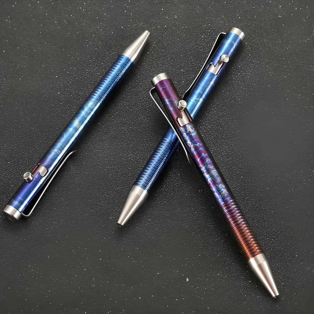 Titanium alloy bolt action ballpoint pen with magic colour phantom finish showing gun bolt handle detail.