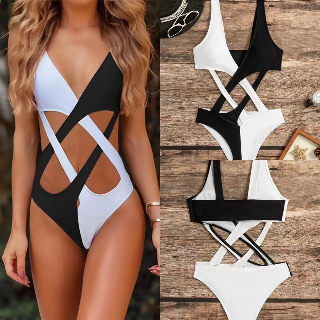 White women's one-piece swimsuit with colour-block panels and hollow-out decorative sections.