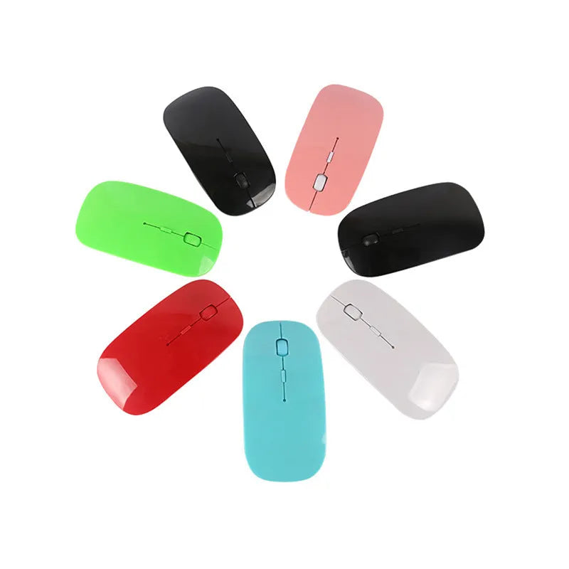Wireless computer mouse with USB receiver available in seven colour choices on desk