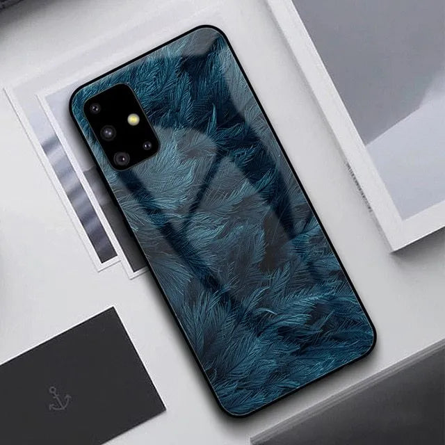 Black silicone phone case for Samsung Galaxy and iPhone smartphones showing port and camera openings