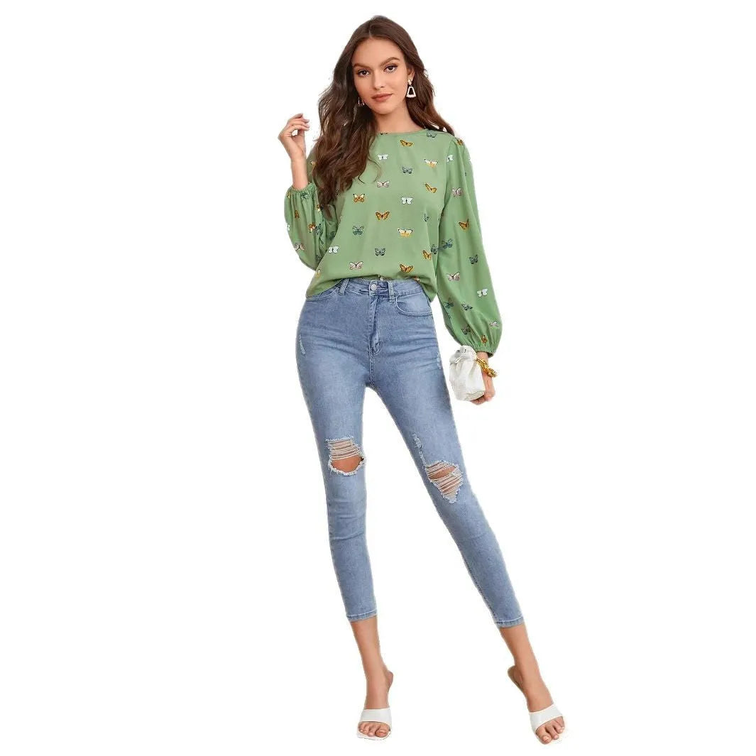 Women's long-sleeved butterfly print shirt in green and orange colour options