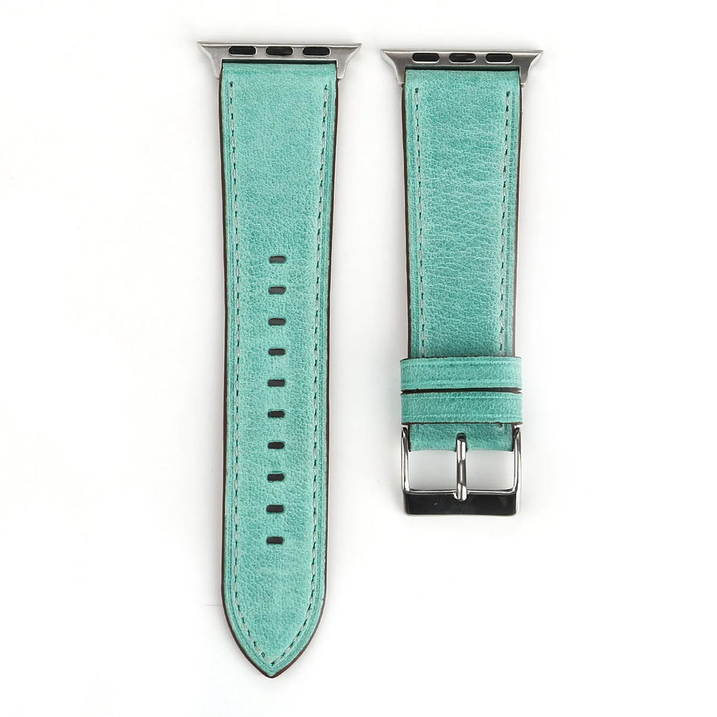 Coloured leather watch strap with a folding buckle on a watch case.