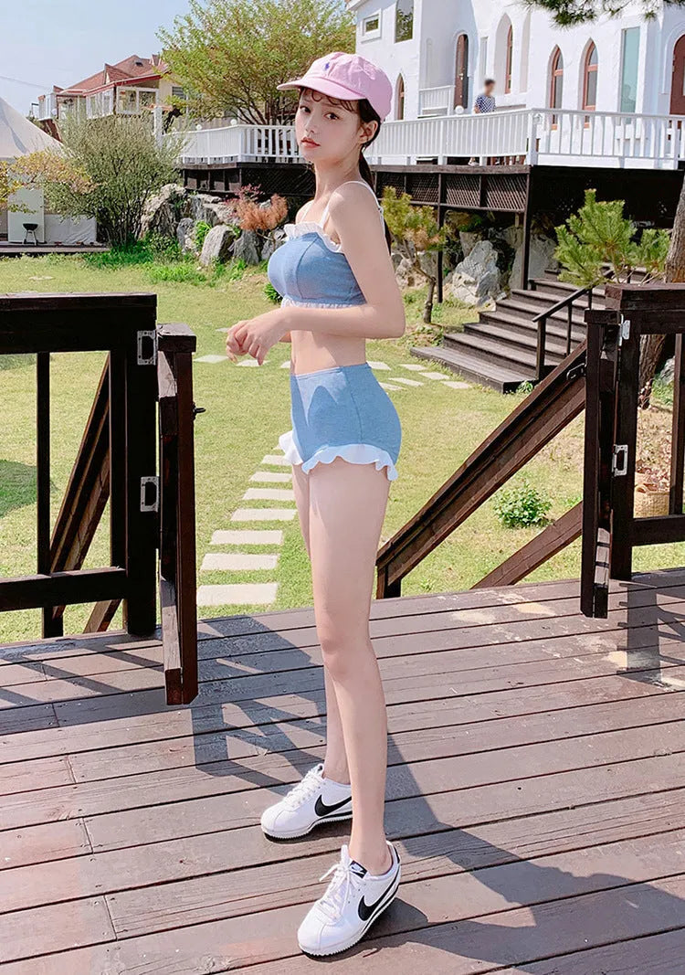 Women's solid colour one-piece swimsuit with split suspenders design in conservative cut