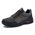Men's brown suede mid-top hiking sneakers with rubber sole and lace-up front.