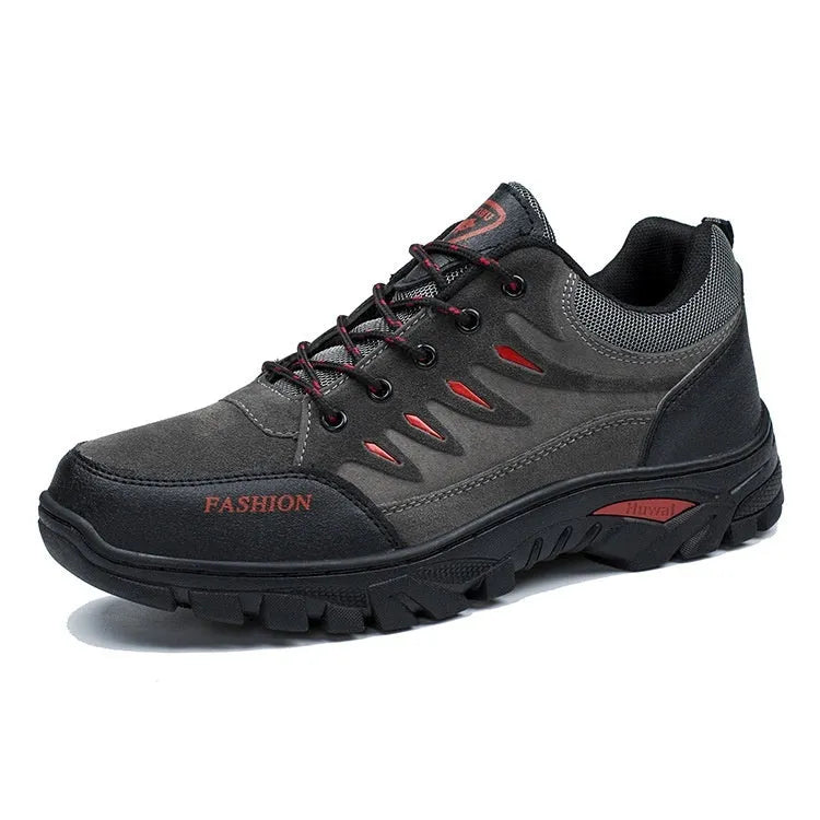 Men's brown suede mid-top hiking sneakers with rubber sole and lace-up front.