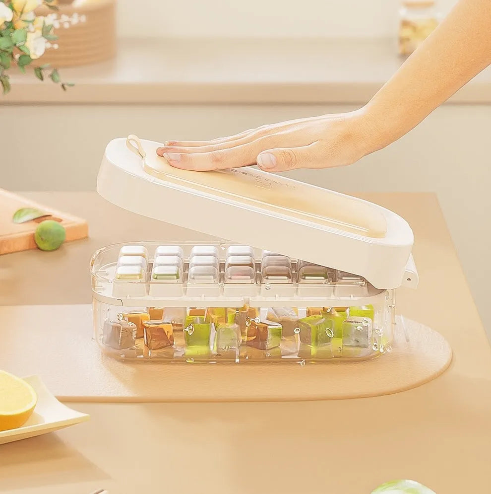 High capacity plastic ice cube tray grid in blue with an ice shovel stored in a dedicated slot.