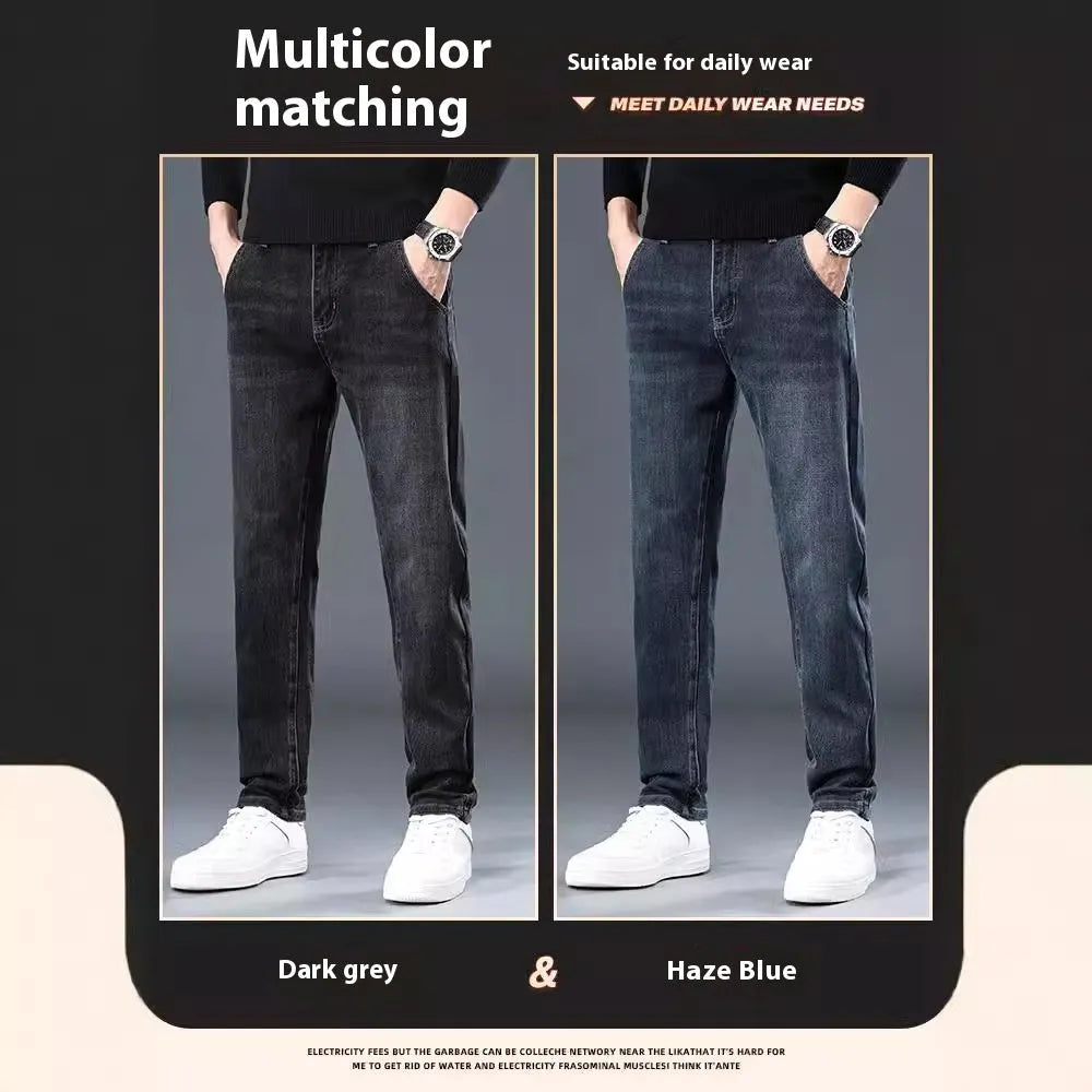 Blue grey men's slim straight casual trousers with a mid waist and zip fly on a neutral background.