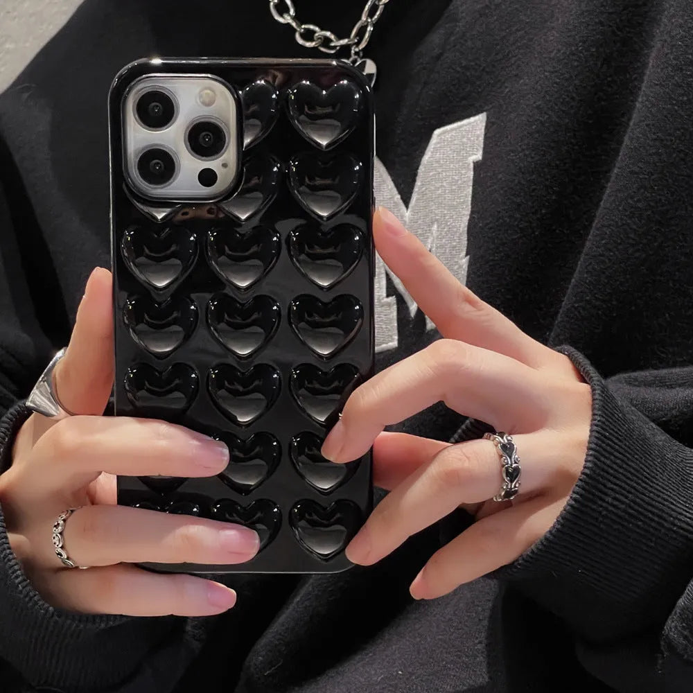 Solid colour 3D heart iPhone case in TPU, back cover style with fall protection, shown for iPhone models