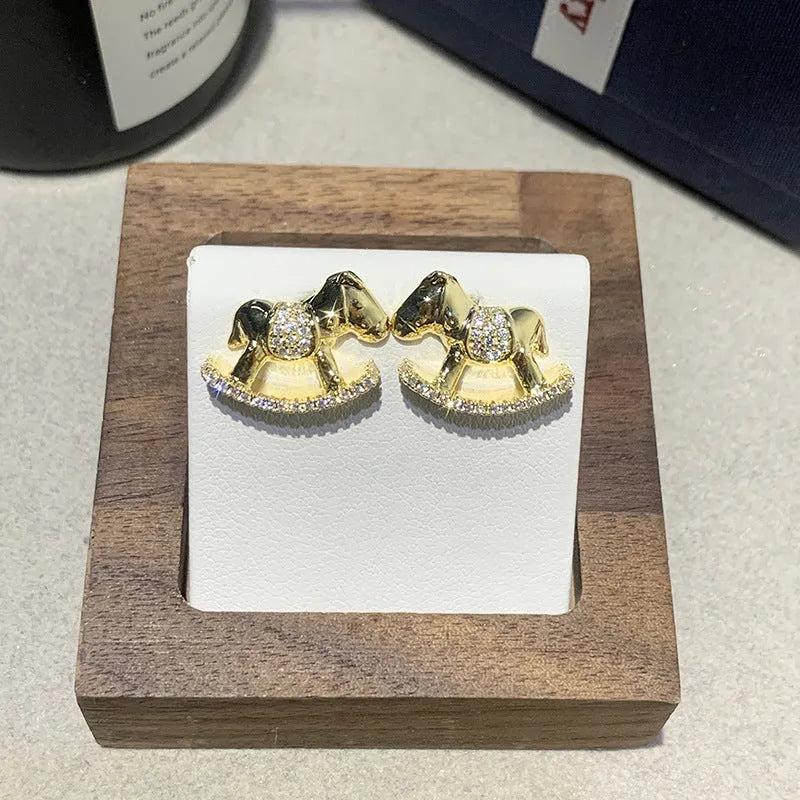 Diamond studded rocking horse earrings for women in Gold or Silvery, light luxury occasion jewellery