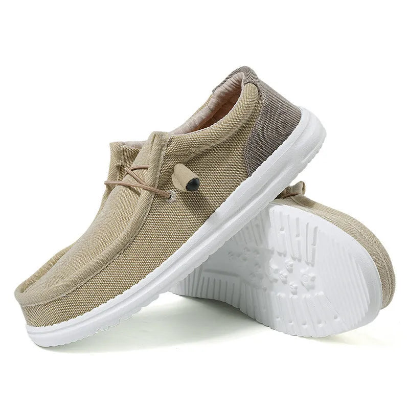 Men's green and orange canvas casual shoes with mosaic pattern detailing and rubber soles