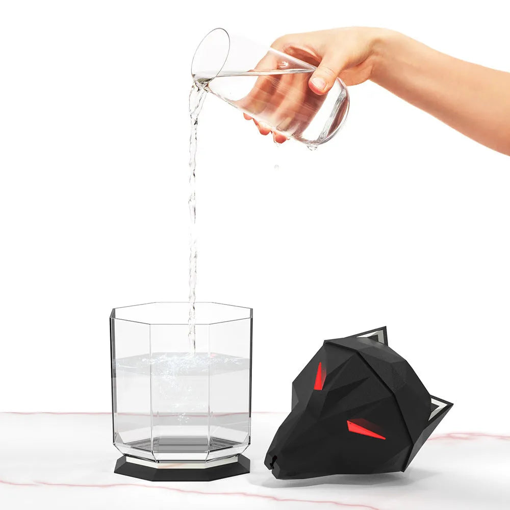 War Wolf black and white ultrasonic desktop humidifier with colourful LED lights on, showing mist outlet.