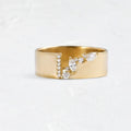 Gold-colour women's ring with zircon centrepiece showing front and side views