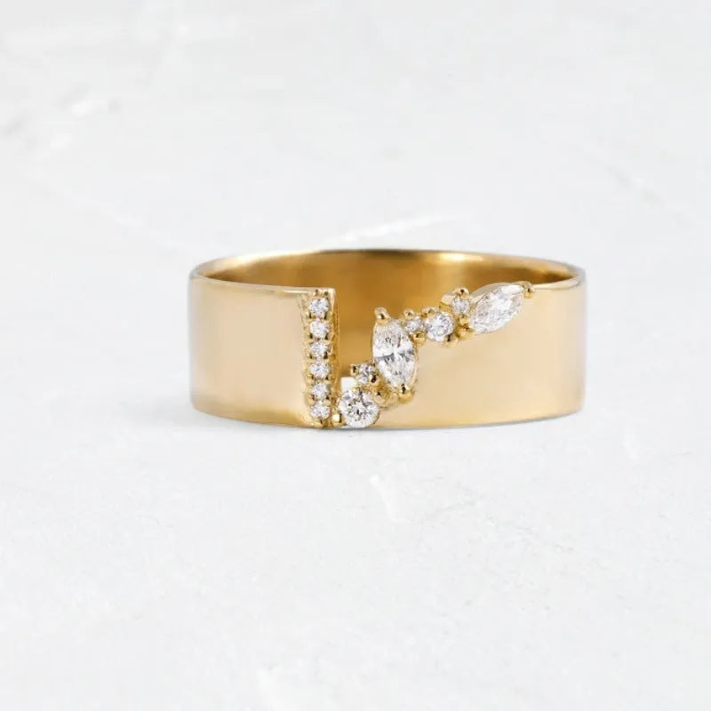 Gold-colour women's ring with zircon centrepiece showing front and side views