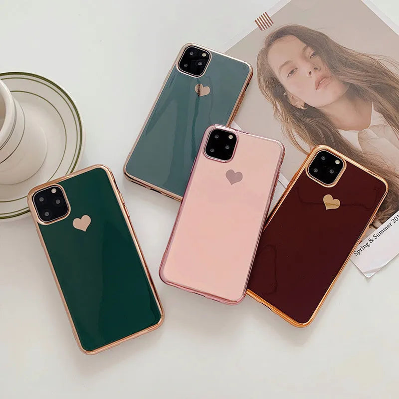 Solid colour TPU back cover phone case for iPhone in blue, claret, pink, or green.