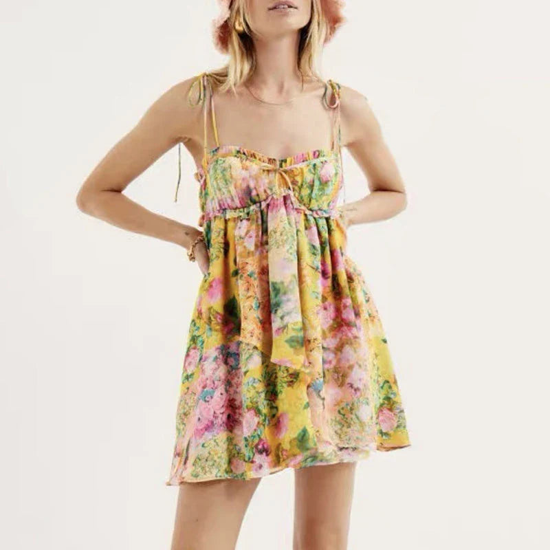 Elegant floral suspender dress with ruffled design, perfect for summer fashion