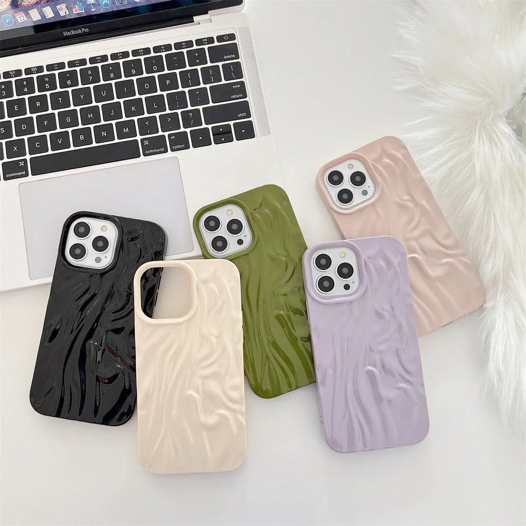 High-grade silicone iPhone case with a water ripple texture in beige white colour on a table.