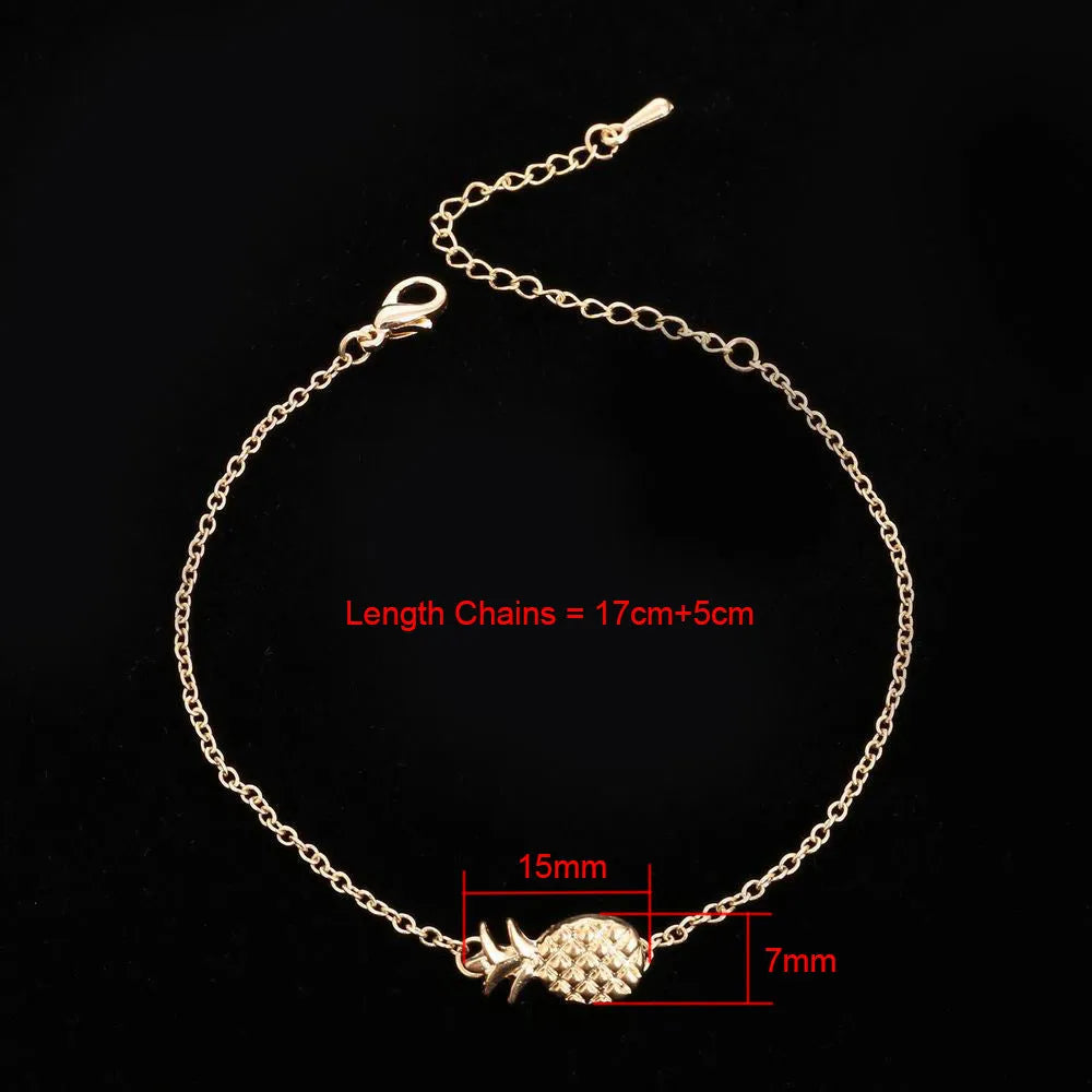 Close-up of a women's alloy bracelet featuring a detailed pineapple charm in a gold or silver tone.