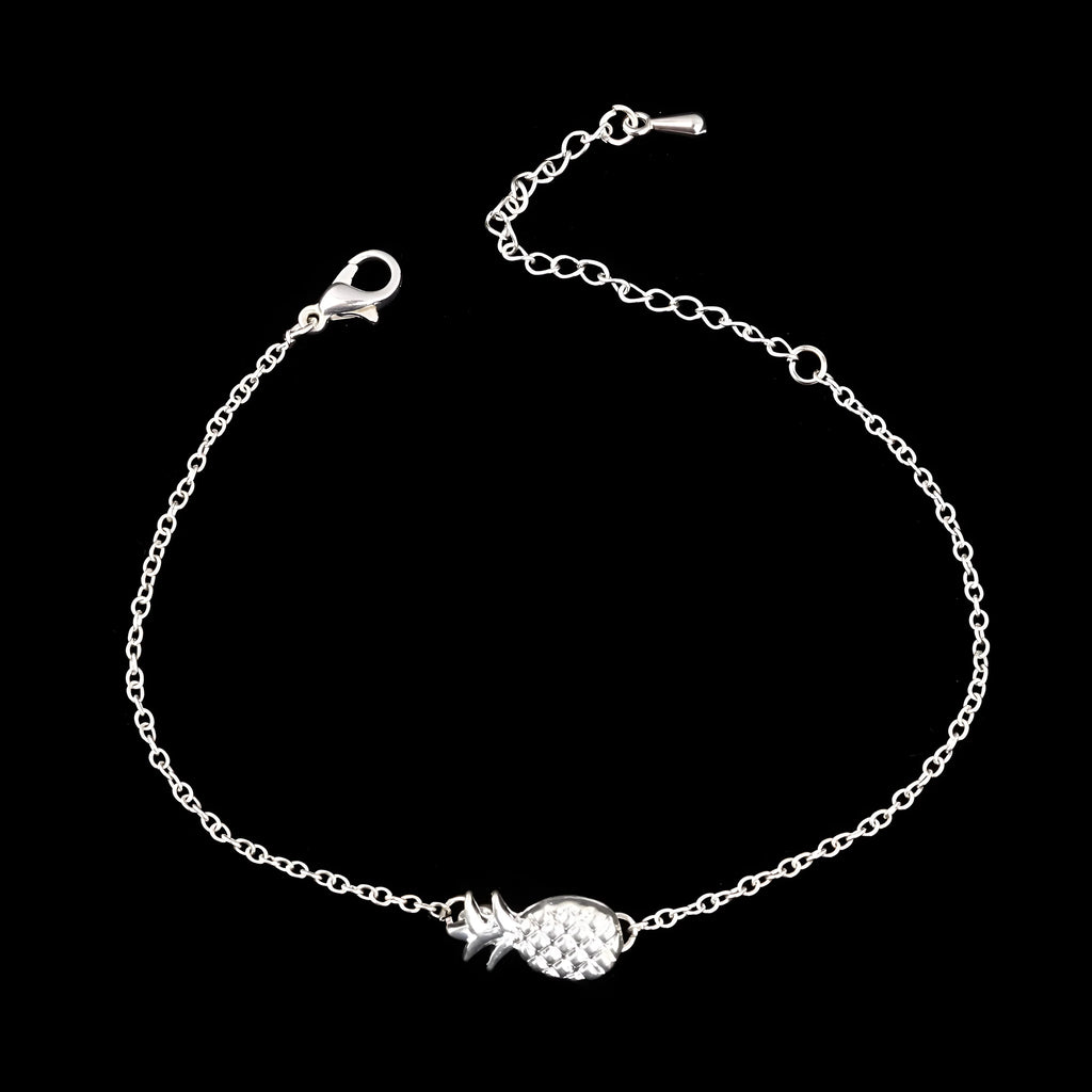 Close-up of a women's alloy bracelet featuring a detailed pineapple charm in a gold or silver tone.