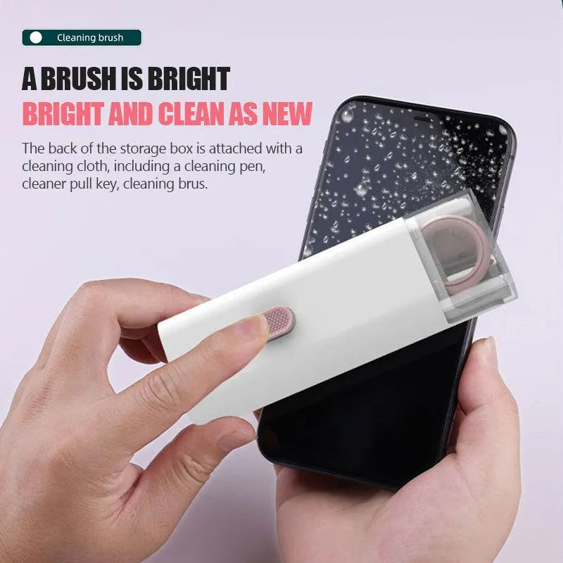 Multifunction electronics cleaning kit with foldable pen, spray bottle, brush, and keycap puller on a white background.