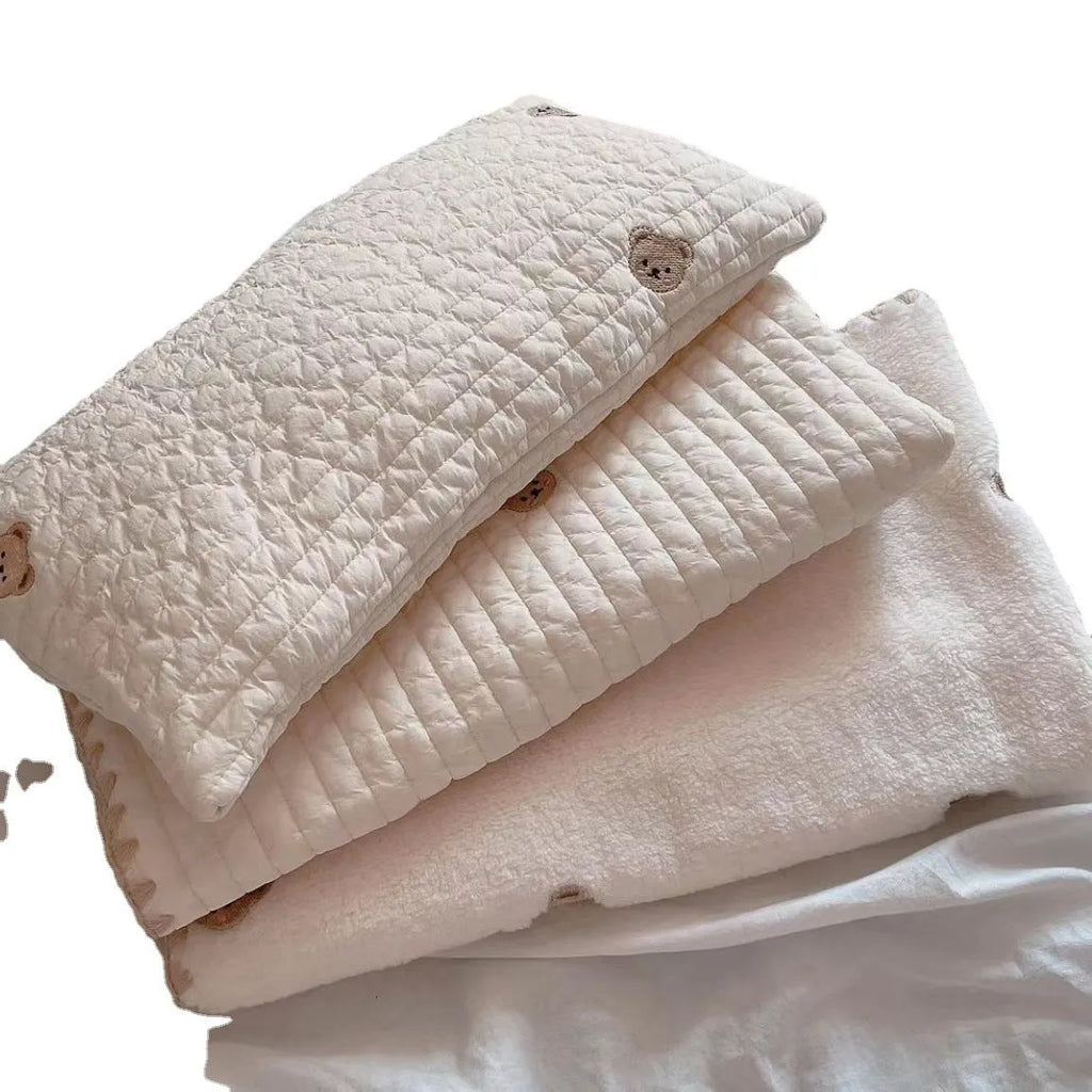 Bear-patterned dog bed set with pillow, mattress, and quilt components in removable washable design